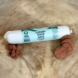Duck pâté for dogs diced and sliced from the roll