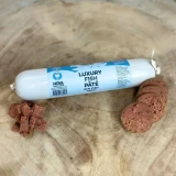 Fish pâté for dogs sliced from the roll