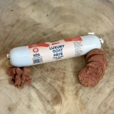 Goat pâté for dogs sliced from the roll