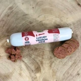 Venison pâté for dogs sliced from the roll