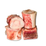 Four small frozen raw beef marrow bones for dogs
