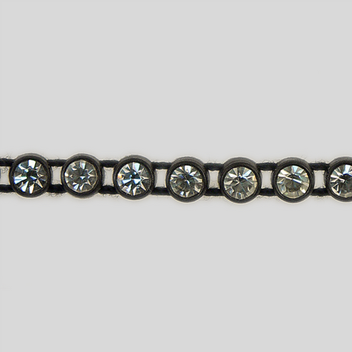 1-row ss13 Crystal, Black Setting, Machine Cut Rhinestone Plastic Banding 1-row ss13 Crystal, Black Setting, Machine Cut Rhinestone Plastic Banding Product