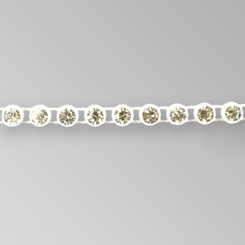 1-row ss15 Crystal, White Setting, Machine Cut Rhinestone Plastic Banding 1-row ss15 Crystal, White Setting, Machine Cut Rhinestone Plastic Banding Product