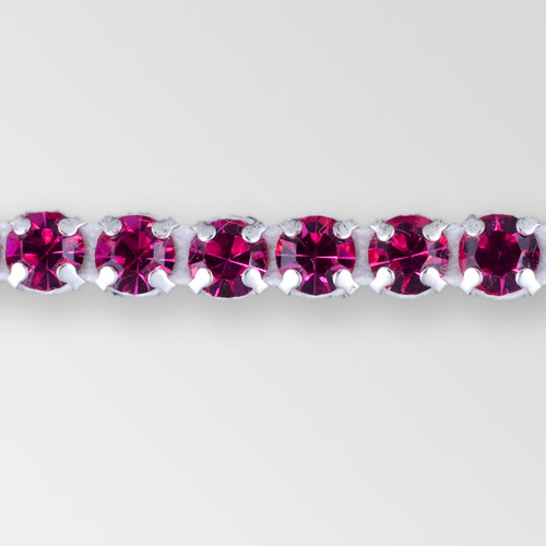 1-row ss19, 4.5mm Machine Cut Metal Set Banding Fuchsia color, Silver Plated on White Tape Product