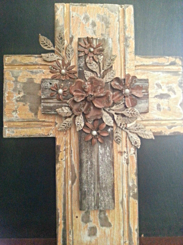 Distressed wood wall cross with tin flower embellishment