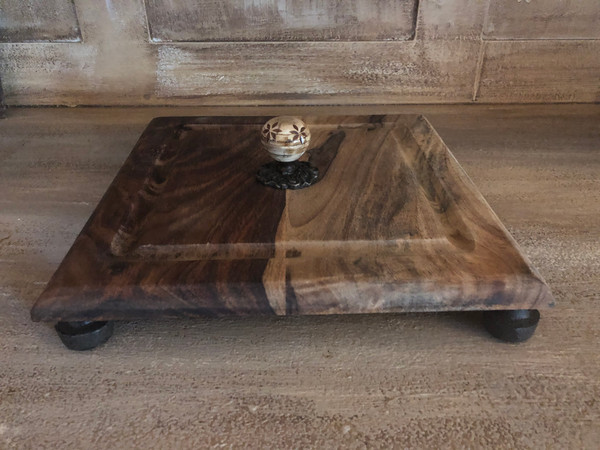 This one of a kind  11x11 artisan board is handcrafted locally. It makes a beautiful statement at home or as a gift.