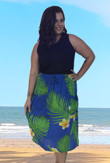 Lenah Summer Ladies skirt , royal blue fabric with fangipani and palm print .