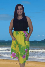 Lenah Summer Ladies skirt, yellow fabric with frangipani and palm print.