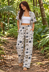 Adele 2 piece shirt and pants set. Print sun eye. Shirt can be worn open with a tank top or boob tube