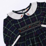 Hand-smocked embroidered bodice with an embroidered peter pan collar