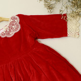 quarter sleeves finished with lace trims