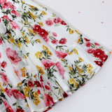 a softly ruffled hemline.