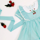 hand embroidered strawberry on bodice and peter pan collar