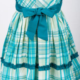 gathered skirt with fabric ruffle of green plaid pinafore