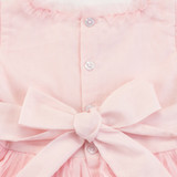 Back belt ties for an adjustable fit, finished with a convenient back-button opening