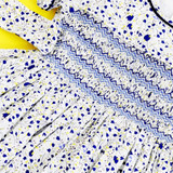 hand smocked geometric panel on bodice