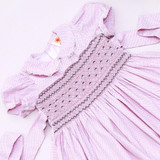 smocked and embroidered bodice