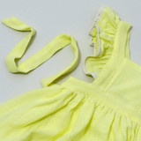 Neon yellow falred dress with flutter sleeves, lace trim, and adjustable straps