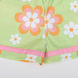 Fabric piping detail along the hemline