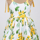 Yellow cord piping detail at the waist with tie-up shoulder straps