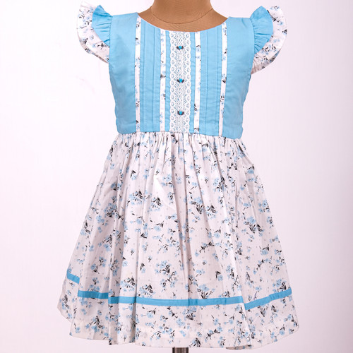 Blue floral cotton dress adorned with delicate tiny hand embroidery.