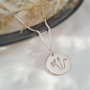 Sterling silver Poppy Silhouette Necklace Sterling silver Poppy Silhouette Necklace