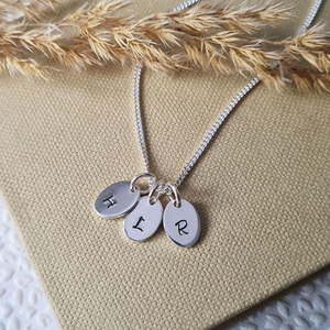 Sterling Silver Initial Charms Necklace Sterling Silver Initial Charms Necklace