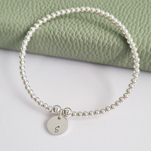 Sterling Silver Stretch Beaded Bracelet with Personalised Initial Charm Sterling Silver Stretch Beaded Bracelet with Personalised Initial Charm