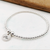 Sterling Silver Stretch Bracelet with Silver Wave Charm