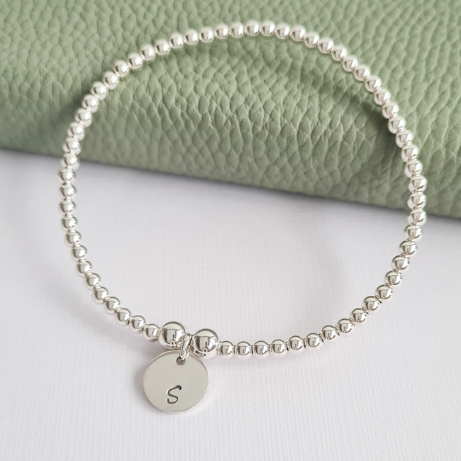 Sterling Silver Stretch Beaded Bracelet with Personalised Initial Charm Sterling Silver Stretch Beaded Bracelet with Personalised Initial Charm