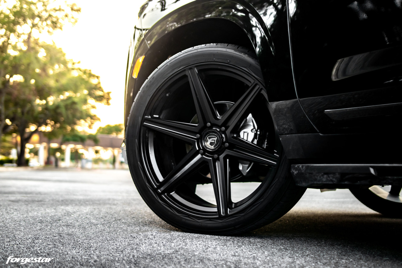 murdered-out-black-cadillac-