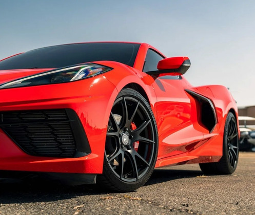 Torch Red C8 Corvette on Forgestar CF5V Satin Black Wheels – 19x9 Fronts & 20x12 Rears.