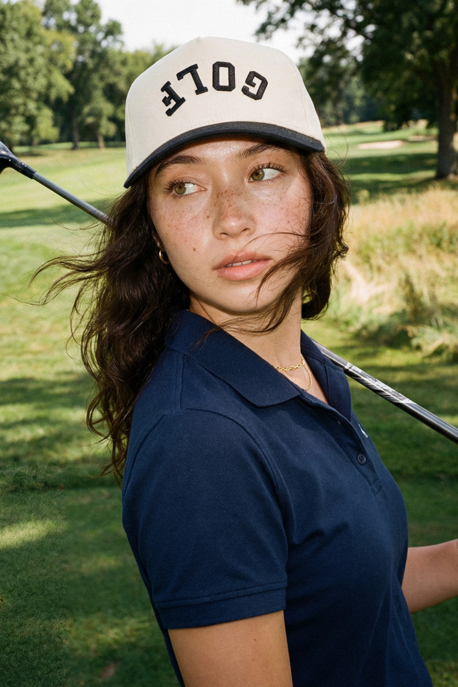Women's Golf Letter Embroidered on Two-Tone Trucker Hat in Black by BURACQ