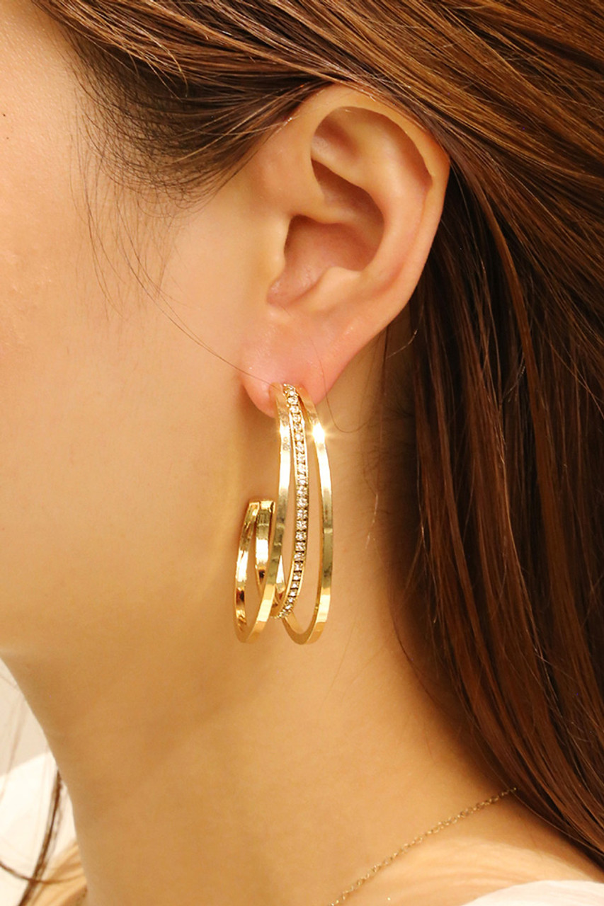 Criss cross shop hoop earrings