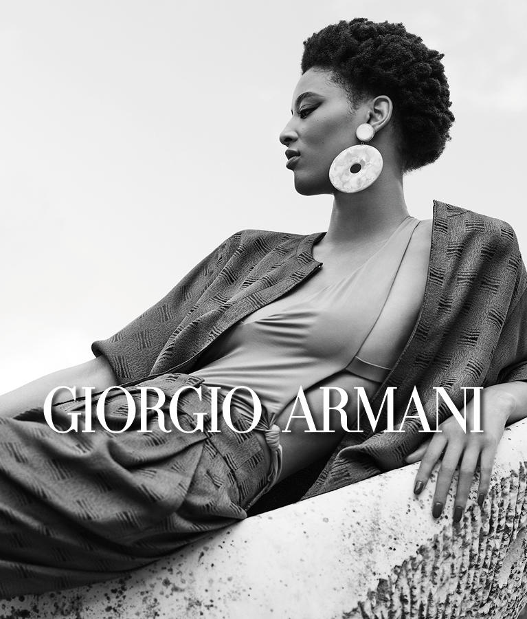 Giorgio Armani explore the catalogue Milan Malpensa Boutique