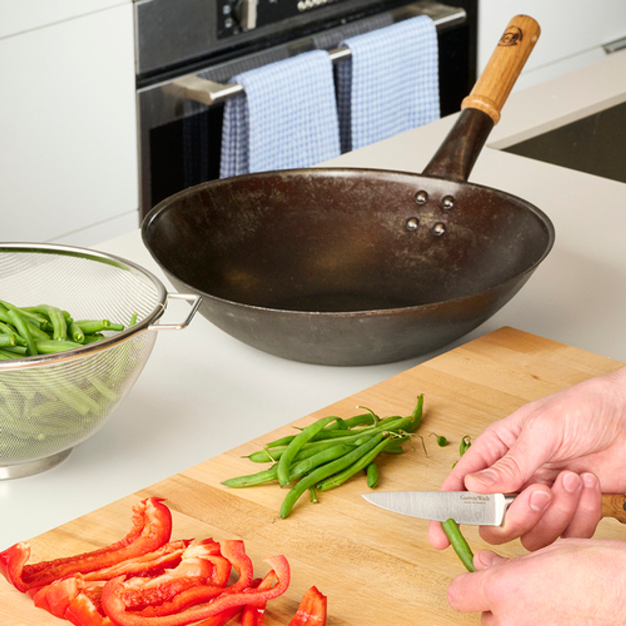 Why a Cast Iron Wok is a Better Alternative: Pros and Cons Compared wi –  Crucible Cookware