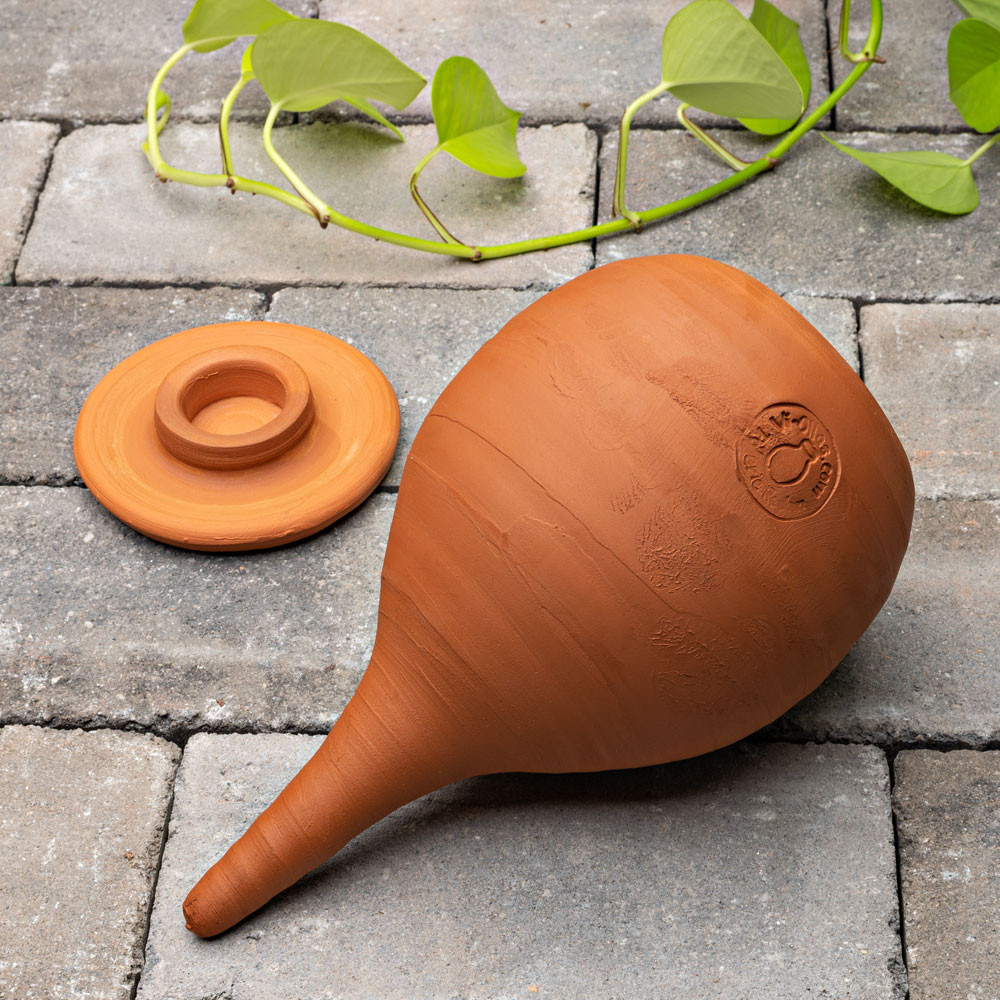 An Olla Pot Serves As Efficient Irrigation System - LawnEQ Blog