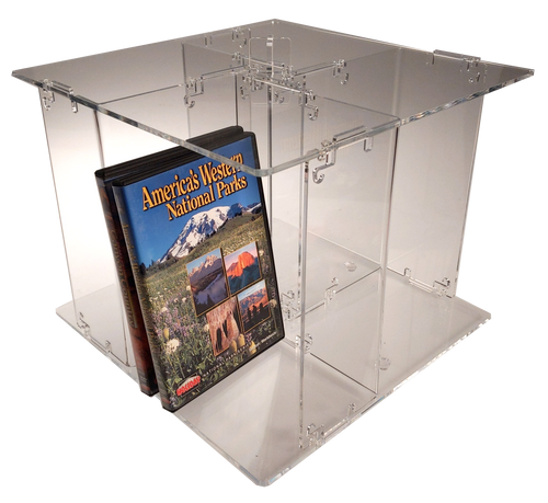 Clear acrylic carousel for DVD and Audiobook sized merchandise.