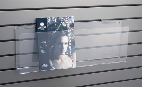 Clear acrylic magazine shelf for slatwall.