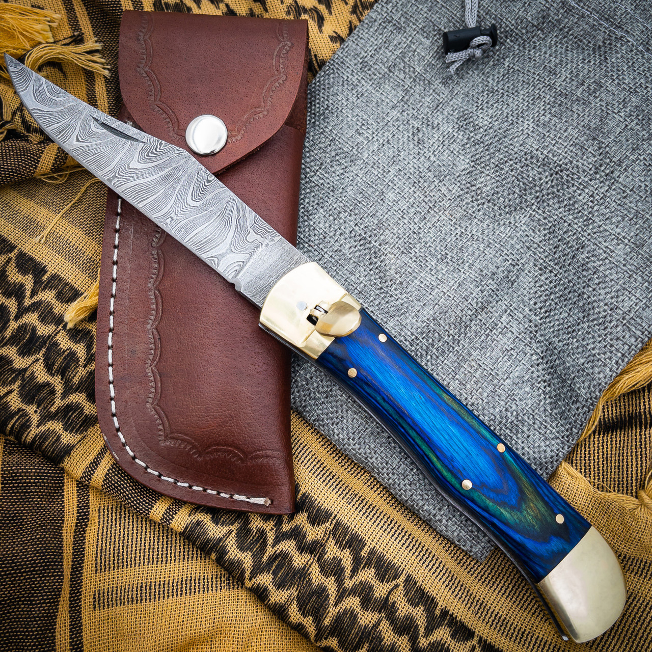 Deep Hole Large Automatic Damascus Clip Point Lever Lock XL