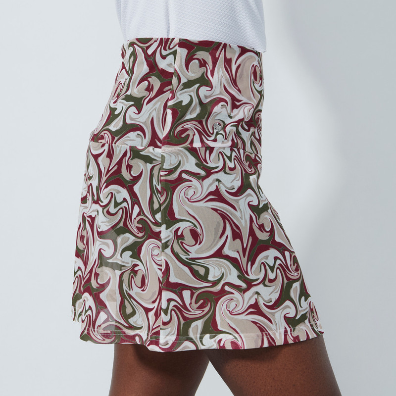 Women’s short golf skort with swirl print from Daily Sports