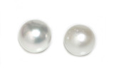 Why is surface clarity so important for pearls?