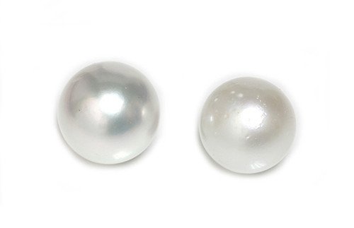 Why is surface clarity so important for pearls?