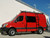 Red Mercedes Sprinter with Aluminess surf poles
