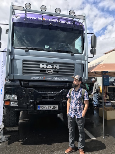 Adventure Vehicle Supply, LLC Founder Rob in front of a MAN truck at 2019's Adventure Vehicle Expo in Dillon, Colorado