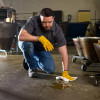 Maintenance technician wiping floor using Z400 industrial wipers