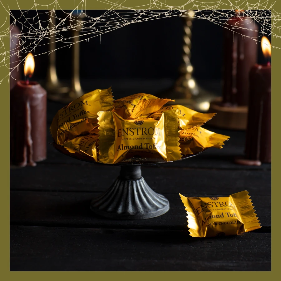 Almond Toffee Petites on a Cake Stand with Lit Candles