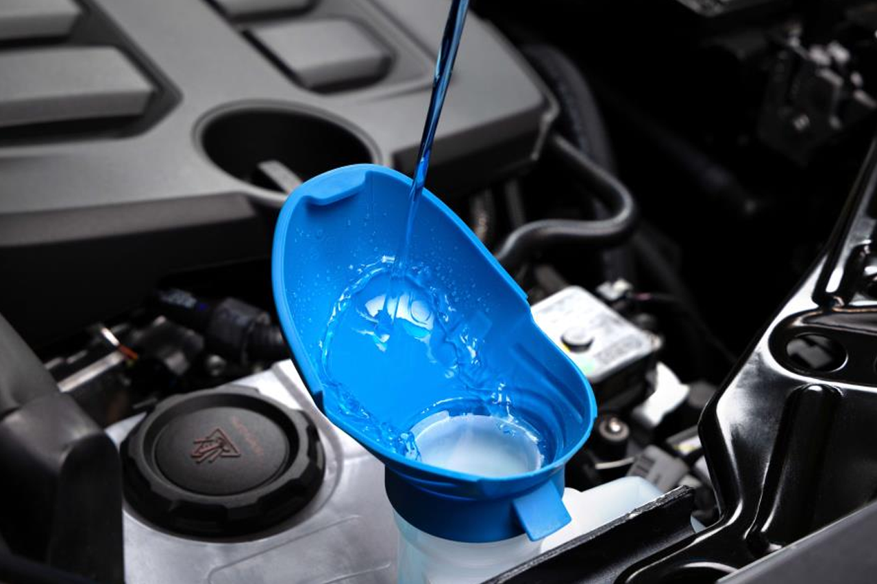 Windshield washer fluid funnel cap