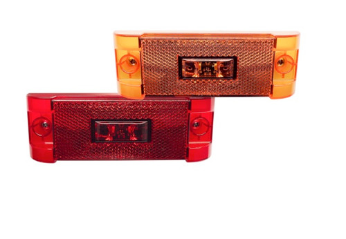 High-resolution image showing TecNiq S22 amber and red 2″ × 6″ LED side marker lights with integrated reflector and sealed heavy-duty housing for trucks and trailers.