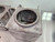 Stainless steel 5in-to-4in reducer adapter with hardware, used for adapting 4" exhaust systems to fit 5" heat kit diverter box and spring plate.